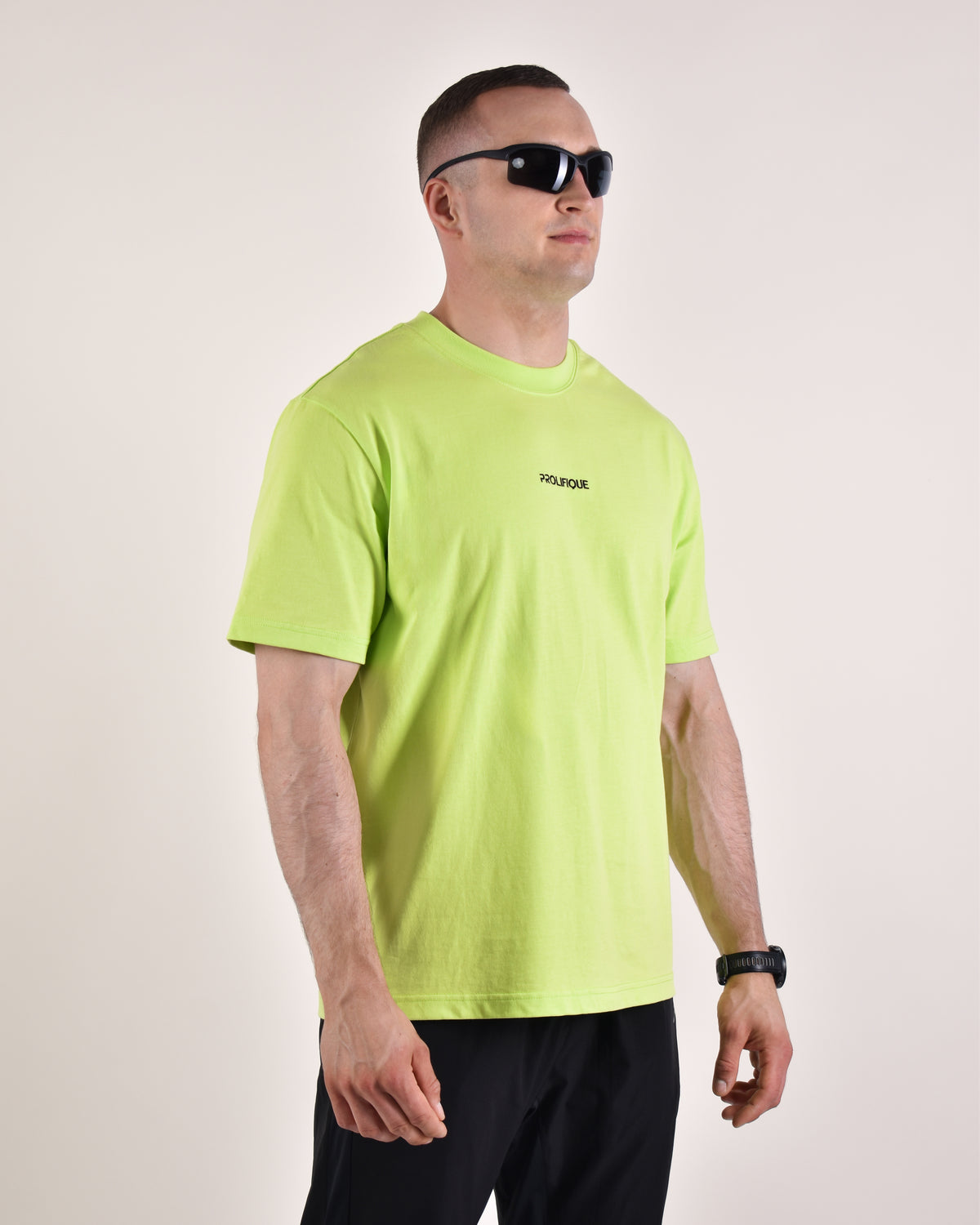 Man wearing the FREY Regular Fit T-Shirt in lime | 185 cm · size L