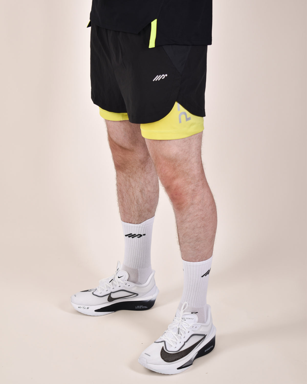 Man wearing the NELO Flex-Dry All-In-One Shorts | 185 cm · size L
